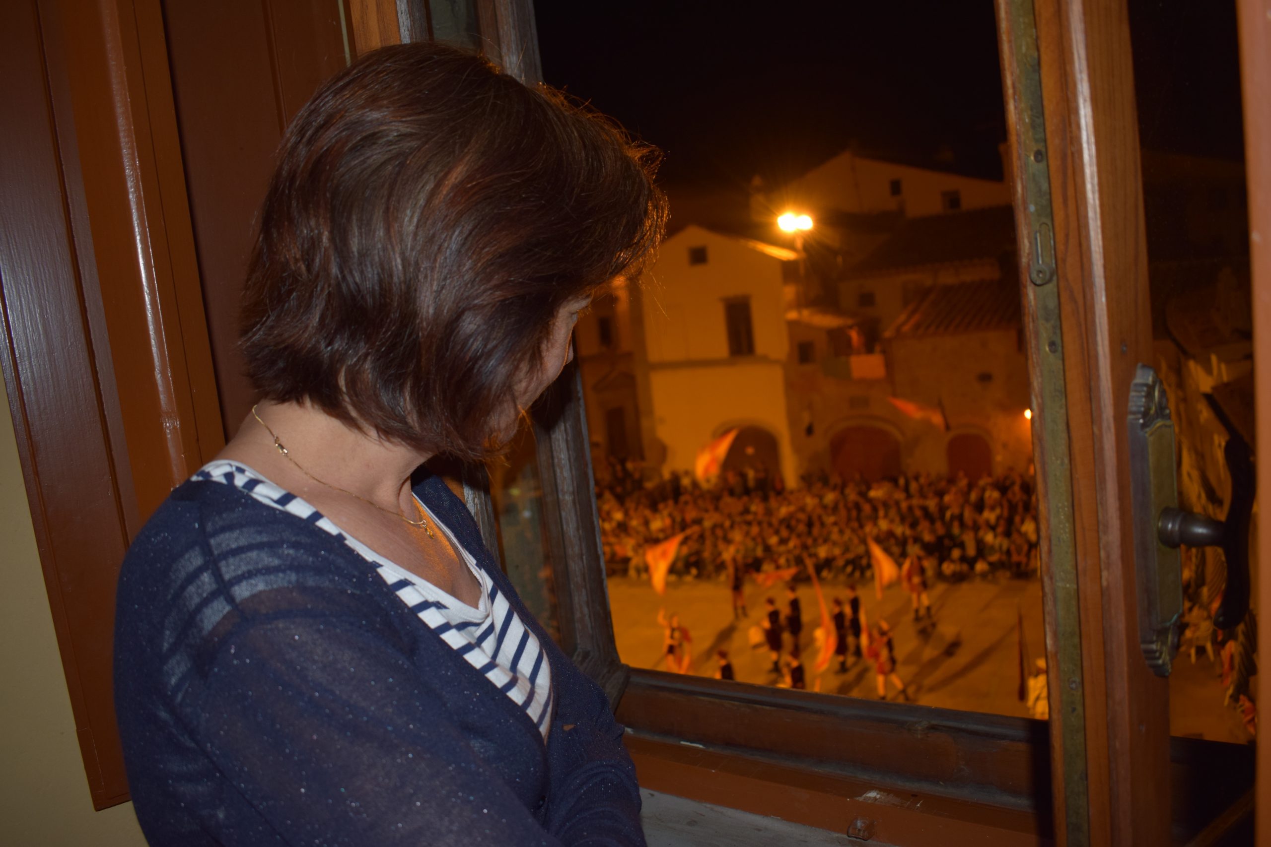 Norma looking out the window
